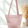 Premium Signature Luxe Tote Bag with structured design, elegant handles, and minimalist luxury style displayed on a marble background with fashion accessories.